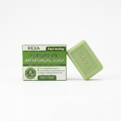 Rexa Natural Tea Tree Cleansing Body Bar in sage green packaging on warm cream background